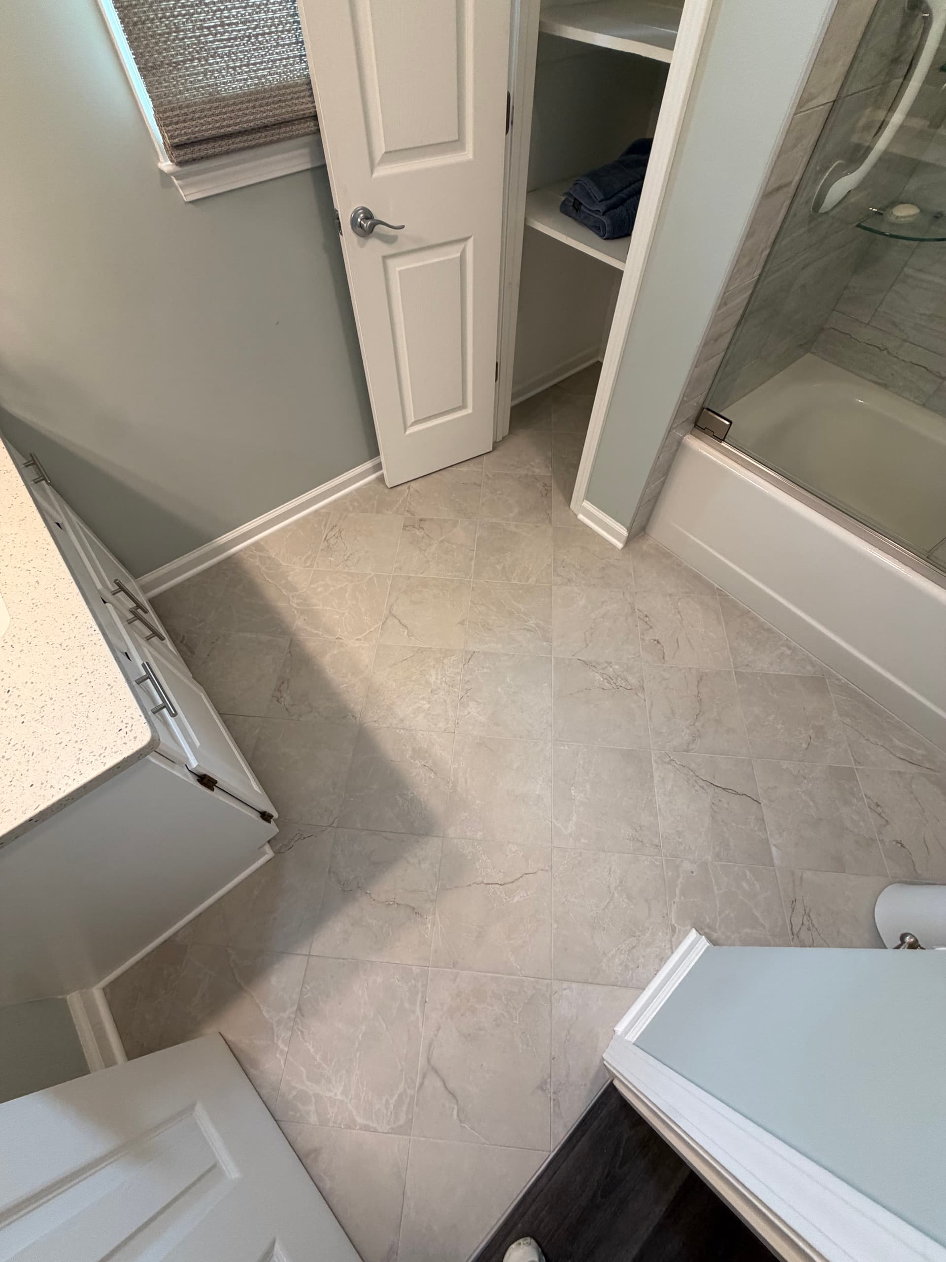 Gallery photos for Diagonal 12x12 Tile Floor Upgrade in a Small Bathroom: Image #2