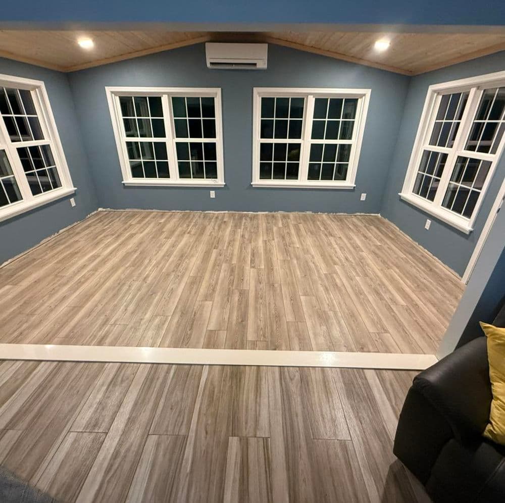 Gallery photos for Sunroom Transformation with Luxury Vinyl Plank Flooring in Cornelius NC: Image #1