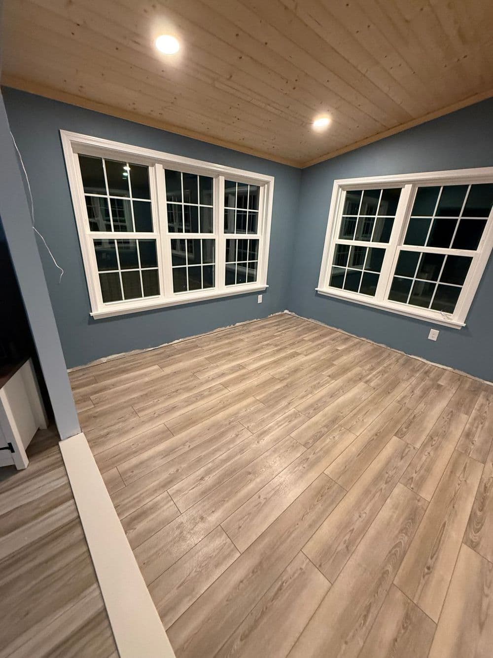 Sunroom Transformation with Luxury Vinyl Plank Flooring in Cornelius NC image