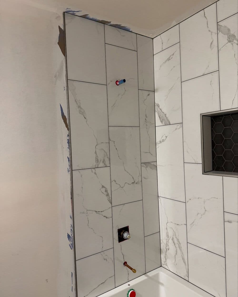 Gallery photos for Bathroom Remodel with Sleek Tub Surround and Tile Floor: Image #9