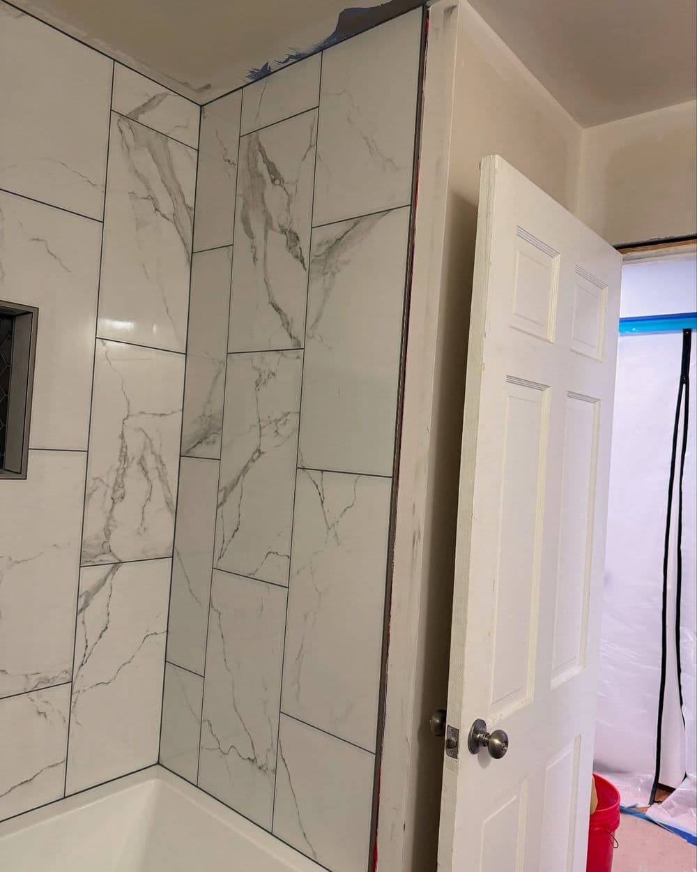 Gallery photos for Bathroom Remodel with Sleek Tub Surround and Tile Floor: Image #6